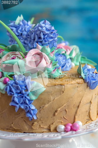 Image of Cake with floral decoration.