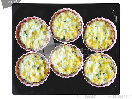 Image of Freshly baked cheese and broccoli pies