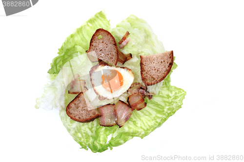 Image of ham and eggs with lettuce and bread