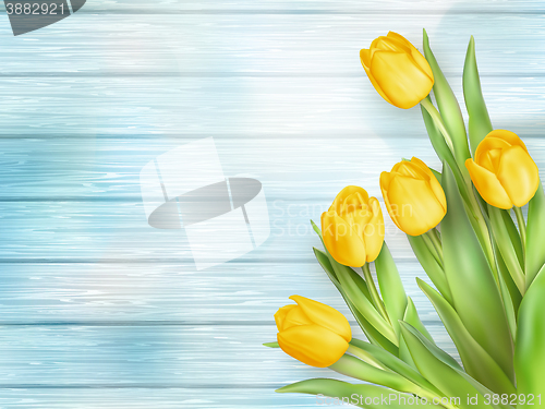 Image of Yellow tulips flowers on wooden planks. EPS 10