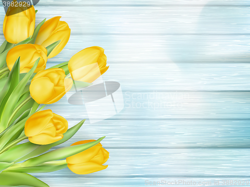 Image of Yellow tulips flowers on wooden planks. EPS 10