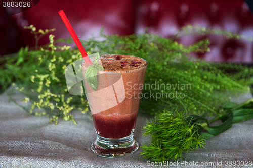 Image of raspberry smoothie with basil
