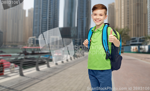 Image of happy student boy with school bag