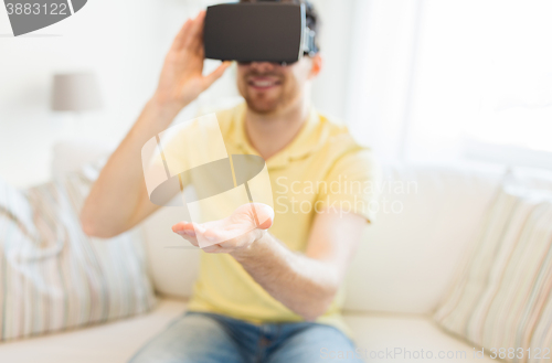 Image of young man in virtual reality headset or 3d glasses