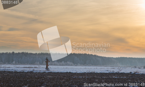 Image of Wintertime sunset over meadow