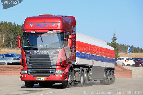 Image of Red Scania R580 Semi Tank Truck Being Parked