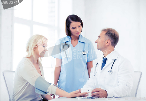 Image of doctor and patient in hospital