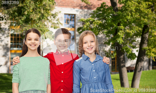 Image of happy children hugging over summer campus