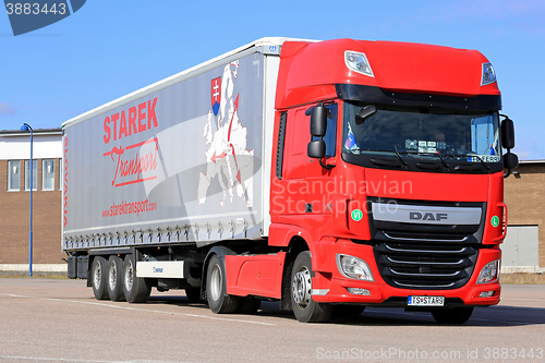 Image of New Red DAF Semi Truck Parked on Asphalt Yard