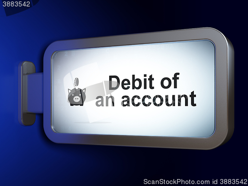 Image of Currency concept: Debit of An account and Money Box With Coin on billboard background