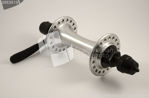 Image of bicycle hub on a neutral background