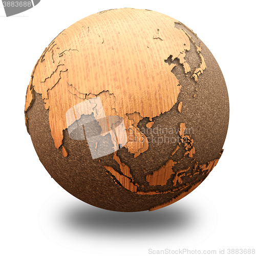 Image of Southeast Asia on wooden planet Earth