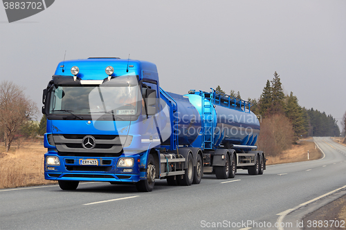 Image of Blue Mercedes-Benz Actros Tank Truck on the Road