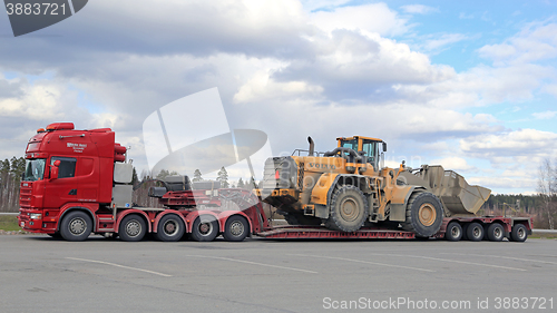 Image of Scania 164G Semi Truck Transports Wheel Loader as Oversize Load