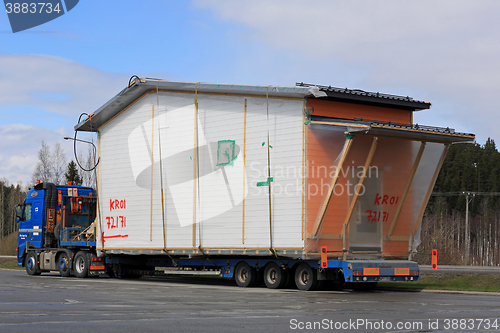 Image of Truck Transports Premade House Module as Oversize Load