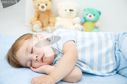 Image of Cute little boy is sleeping