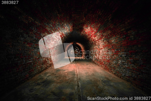 Image of Long underground brick tunnel angle shot