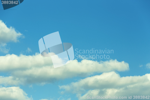 Image of White clouds on evening blue sky