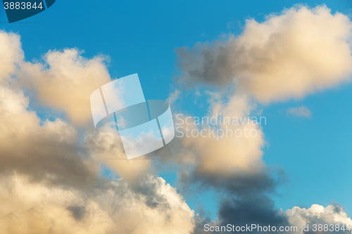 Image of White clouds on evening blue sky