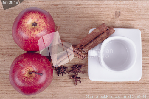 Image of apple cinnamon and empty cup