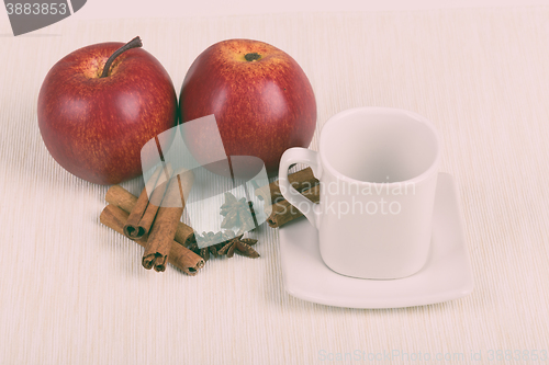 Image of apple cinnamon and empty cup