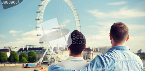 Image of close up of male gay couple looking at london view