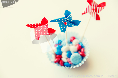 Image of candies with pinwheel toys on independence day