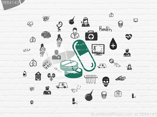 Image of Healthcare concept: Pills on wall background