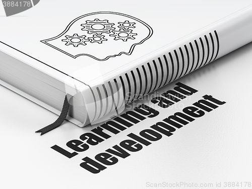 Image of Education concept: book Head With Gears, Learning And Development on white background
