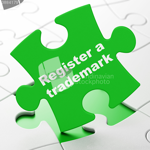 Image of Law concept: Register A Trademark on puzzle background