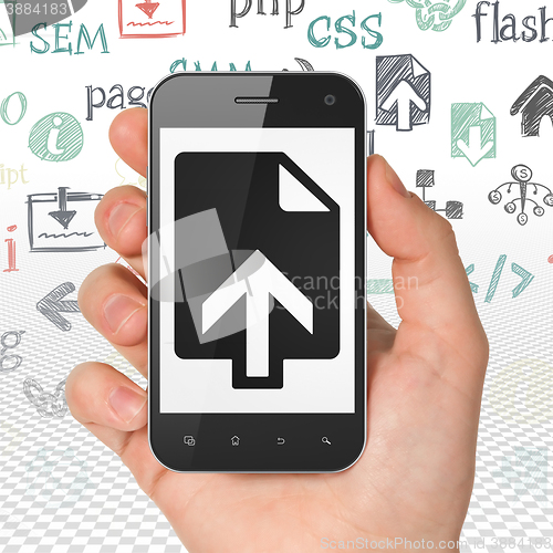 Image of Web development concept: Hand Holding Smartphone with Upload on display
