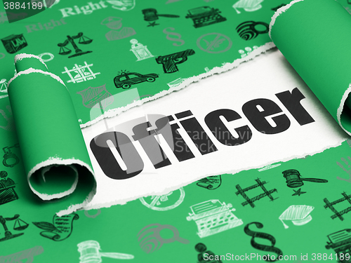 Image of Law concept: black text Officer under the piece of  torn paper