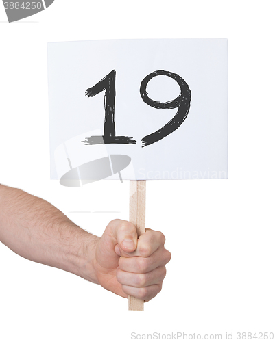 Image of Sign with a number, 19