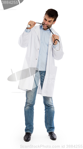 Image of Humorous portrait of a young depressed surgeon with a stethoscop