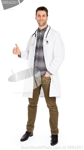Image of Happy male doctor showing thumb up