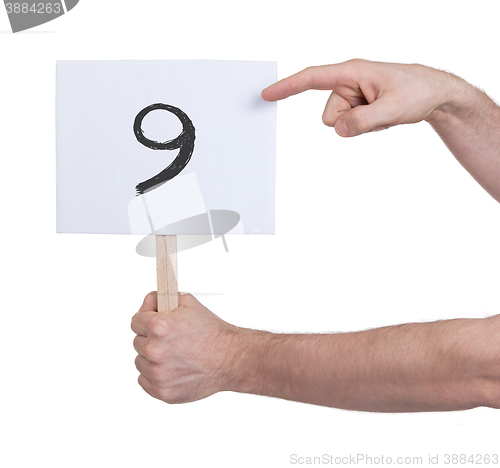 Image of Sign with a number, 9