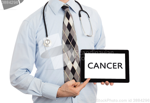 Image of Doctor holding tablet - Cancer