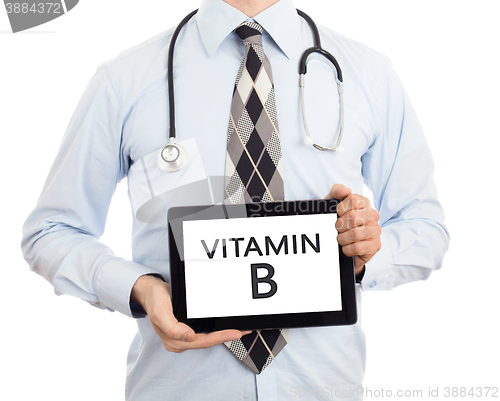 Image of Doctor holding tablet - Vitamin B