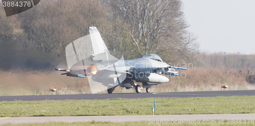 Image of LEEUWARDEN, NETHERLANDS - APRIL 11, 2016: A dutch F-16 on the gr