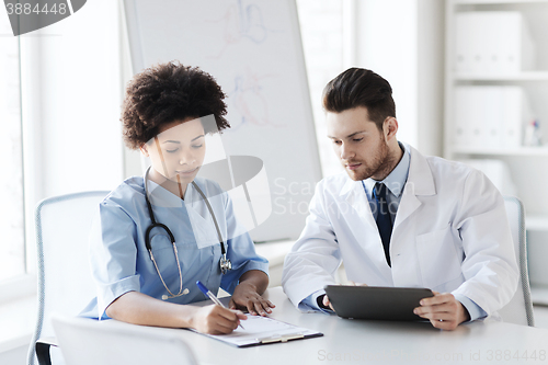 Image of two doctors meeting at hospital office