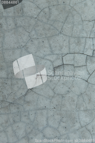 Image of cracked gray concrete wall texture