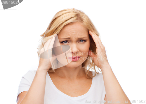 Image of unhappy woman suffering from headache