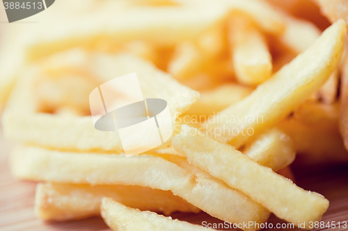 Image of close up of french fries on table