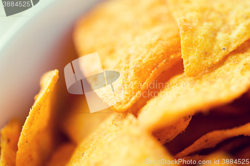 Image of close up of corn crisps or nachos in bowl