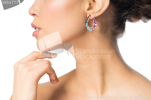 Image of close up of beautiful woman face with earring