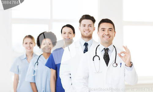 Image of group of happy doctors at hospital