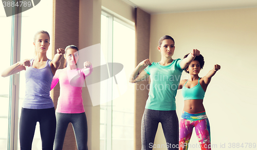 Image of group of women working out in gym