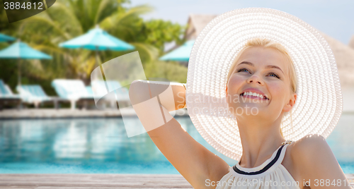 Image of beautiful woman enjoying summer over beach