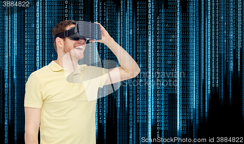 Image of happy man in virtual reality headset or 3d glasses