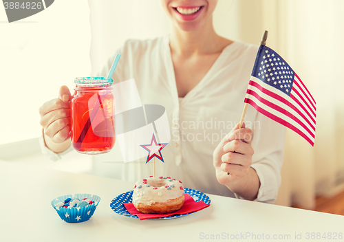 Image of happy woman celebrating american independence day